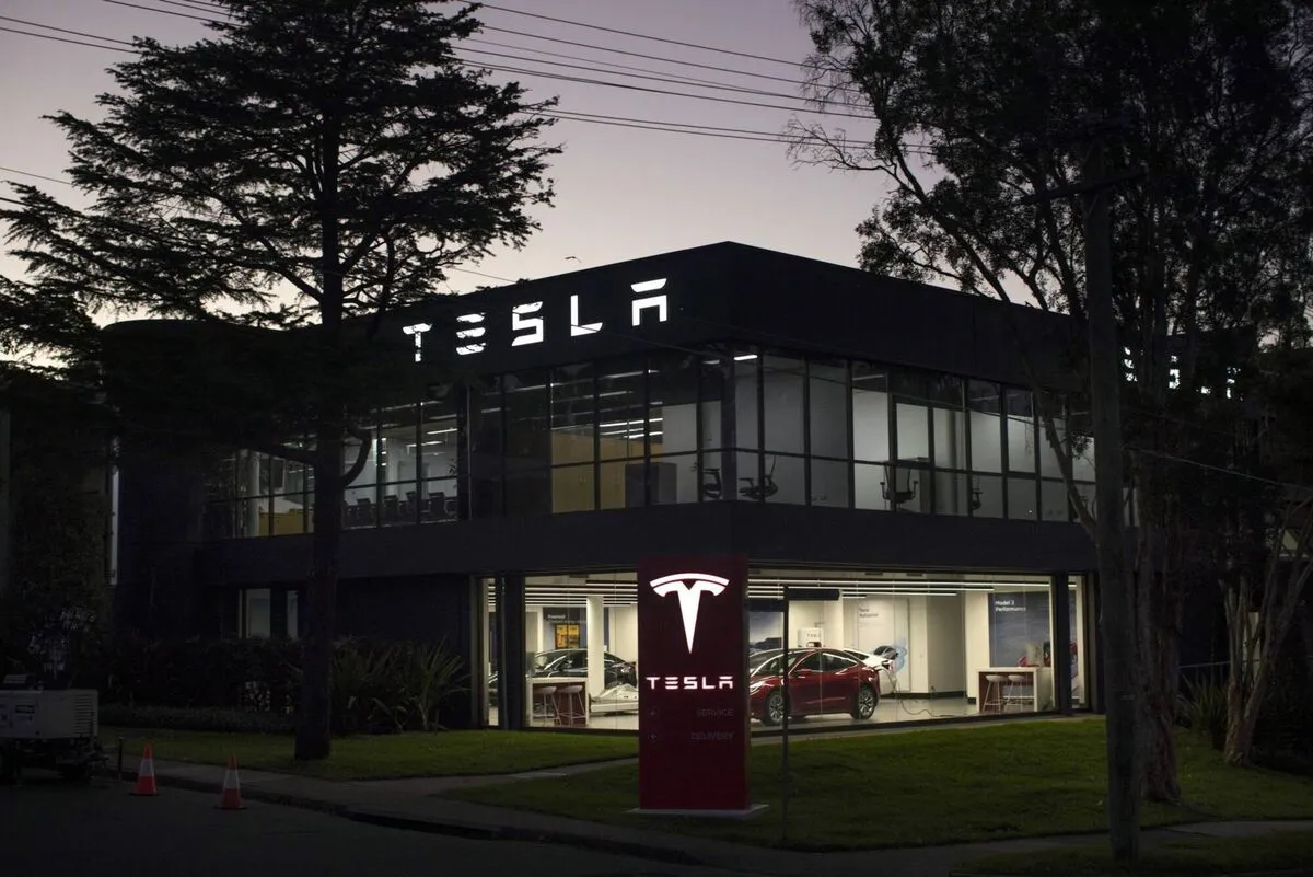 Tesla Cork service centre exterior at Fota Junction, photographed at dusk.