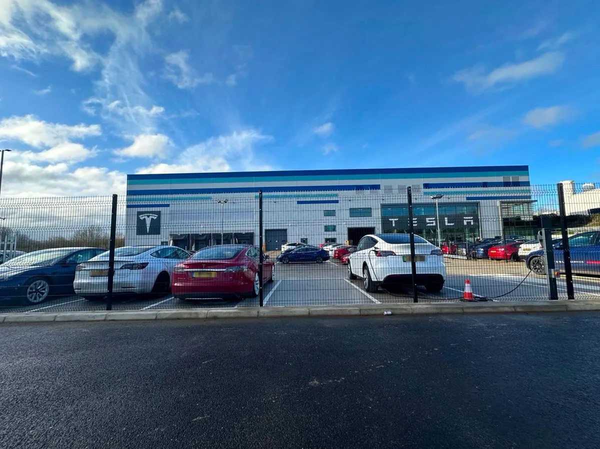 Tesla Milton Keynes service centre exterior at Merton Drive, photographed for the centre opening.