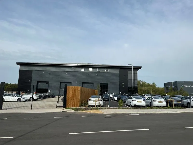 Tesla Solihull service building and customer vehicles.